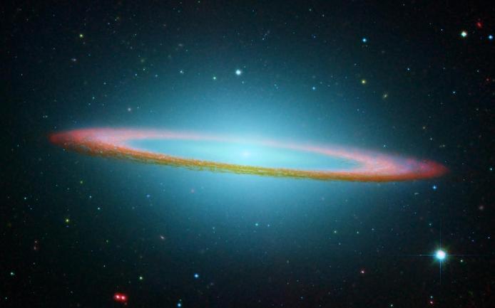 Прекрасний "космічний ореол", Галактика Сомбреро, приховує у своєму темному серце надмасивну чорну діру, як, втім, і всі інші галактики