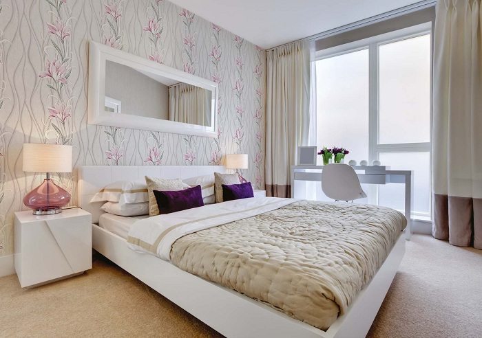 Modern furnished bedroom interior within new home